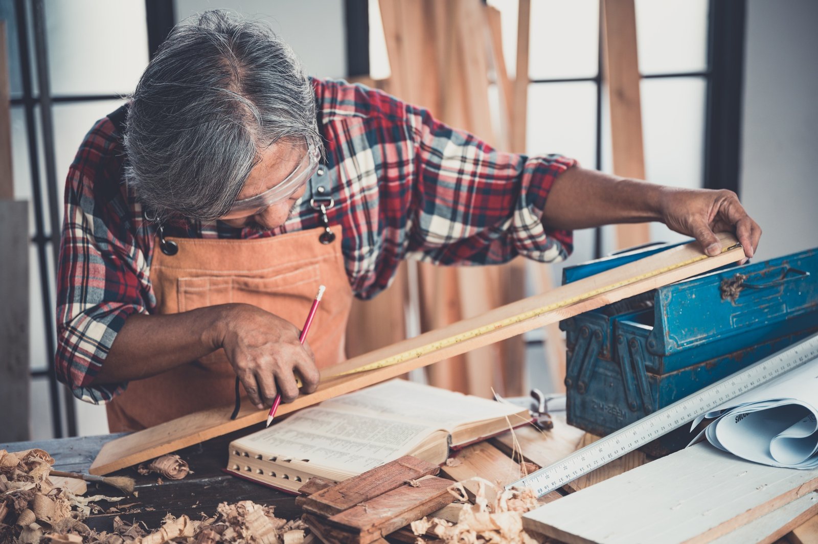Woodwork and furniture making concept. Carpenter in the workshop